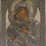 A LARGE ICON SHOWING THE VLADIMIRSKAYA MOTHER OF GOD WITH A SILVER-GILT OKLAD - photo 1