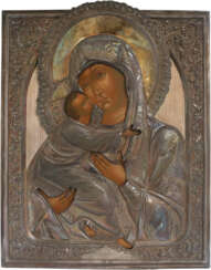 A LARGE ICON SHOWING THE VLADIMIRSKAYA MOTHER OF GOD WITH A SILVER-GILT OKLAD