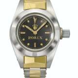 ROLEX. AN EXCEPTIONALLY HISTORICALLY IMPORTANT STAINLESS STEEL AUTOMATIC EXPERIMENTAL WRISTWATCH WITH SWEEP CENTRE SECONDS ESPECIALLY CONSTRUCTED FOR DEPTH PRESSURE TESTING PURPOSES, WITH A STAINLESS STEEL AND GOLD ROLEX BRACELET - Foto 1
