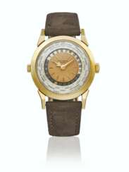 PATEK PHILIPPE. AN EXTREMELY FINE, HIGHLY IMPORTANT AND THE FIRST 18K GOLD TWO CROWN WORLD-TIME WRISTWATCH WITH 24 HOURS INDICATION AND FIRST TIME SEEN WAVED GUILLOCHE GOLD DIAL