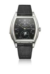 PATEK PHILIPPE. A VERY RARE PLATINUM TONNEAU-SHAPED AUTOMATIC MINUTE REPEATING PERPETUAL CALENDAR WRISTWATCH WITH RETROGRADE DATE, MOON PHASES, LEAP YEAR INDICATION, ADDITIONAL DIAL AND CERTIFICATES OF ORIGIN