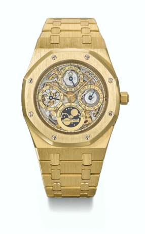 AUDEMARS PIGUET. A VERY RARE AND ATTRACTIVE 18K GOLD SKELETONIZED PERPETUAL CALENDAR AUTOMATIC WRISTWATCH WITH MOON PHASES, BRACELET AND GUARANTEE - photo 1
