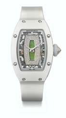 RICHARD MILLE. A LADY&#39;S RARE AND ATTRACTIVE CERAMIC, 18K WHITE GOLD AND DIAMOND-SET TONNEAU-SHAPED LIMITED EDITION AUTOMATIC SEMI-SKELETONIZED WRITHWATCH WITH NEPHRITE DIAL