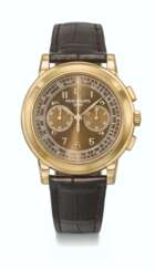 PATEK PHILIPPE. AN EXTREMELY RARE AND HIGHLY ATTRACTIVE 18K GOLD LIMITED EDITION CHRONOGRAPH WRISTWATCH WITH CERTIFICATE OF ORIGIN AND BOX - &#39;SAATCHI EDITION&#39;