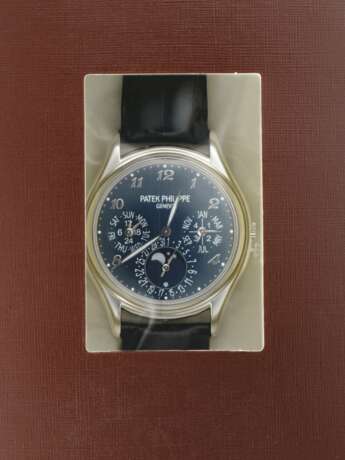 PATEK PHILIPPE. AN UNIQUE PLATINUM AUTOMATIC PERPETUAL CALENDAR WRISTWATCH WITH MOON PHASES, 24 HOUR, LEAP YEAR INDICATION, BREGUET NUMERALS, CERTIFICATE OF ORIGIN AND BOX - DOUBLE SEALED - photo 1