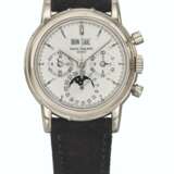 PATEK PHILIPPE. A RARE 18K WHITE GOLD PERPETUAL CALENDAR CHRONOGRAPH WRISTWATCH WITH MOON PHASES, 24 HOUR INDICATION, LEAP YEAR INDICATION, CERTIFICATE OF ORIGIN AND BOX - photo 1