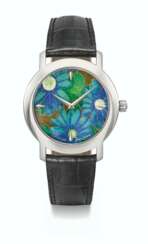 PATEK PHILIPPE. A VERY RARE AND ATTRACTIVE 18K WHITE GOLD AUTOMATIC WRISTWATCH WITH BLUE FLOWERS CLOISONNE ENAMEL DIAL, CERTIFICATE OF ORIGIN AND BOX