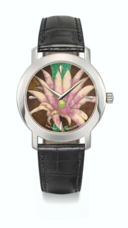 PATEK PHILIPPE. A VERY RARE 18K WHITE GOLD AUTOMATIC WRISTWATCH WITH WHITE FLOWERS CLOISONNE ENAMEL DIAL, CERTIFICATE OF ORIGIN AND BOX - Foto 1