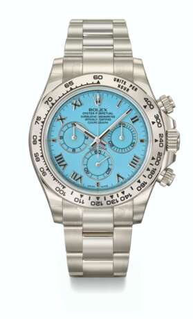 ROLEX. A RARE AND ATTRACTIVE 18K WHITE GOLD AUTOMATIC CHRONOGRAPH WRISTWATCH WITH TURQUOISE DIAL, GUARANTEE AND BOX - Foto 1