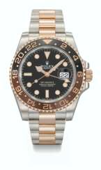 ROLEX. A STAINLESS STEEL AND 18K PINK GOLD AUTOMATIC DUAL TIME WRISTWATCH WITH SWEEP CENTRE SECONDS, DATE, BRACELET, GUARANTEE AND BOX