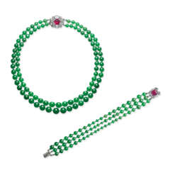 IMPORTANT JADEITE, RUBY AND DIAMOND NECKLACE, BY CARTIER; AND A JADEITE, RUBY AND DIAMOND BRACELET, MOUNTED BY CARTIER