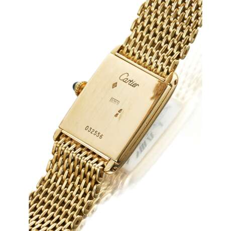 CARTIER, YELLOW GOLD 'TANK ARRONDIE' - фото 3