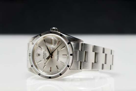 Rolex Oyster Perpetual Date - фото 7