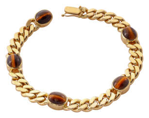 Gold bracelet with tiger eyes