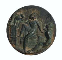 A GREEK BRONZE MIRROR COVER