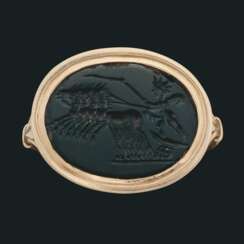 A ROMAN GREEN JASPER MAGIC GEM WITH HELIOS IN HIS CHARIOT