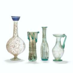 FOUR ROMAN GLASS VESSELS