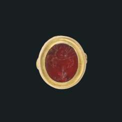 A ROMAN CARNELIAN INTAGLIO WITH CRAB AND FROG