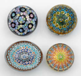 Four paperweights with millefiori decor