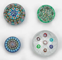 Four small millefiori paperweights
