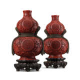 A RARE PAIR OF CARVED CINNABAR LACQUER ‘DA JI’ DOUBLE-GOURD FORM VASES - photo 1