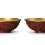 A RARE PAIR OF IMPERIAL CARVED CINNABAR LACQUER `DRAGON` BOWLS - photo 1