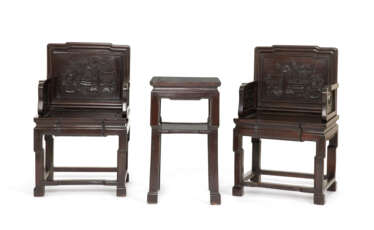 A SET OF FOUR CARVED HARDWOOD ARMCHAIRS AND TWO SQUARE SIDE TABLES