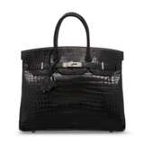 A SHINY BLACK POROSUS CROCODILE BIRKIN 35 WITH PALLADIUM HARDWARE - photo 1