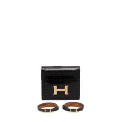 A SET OF THREE : A SHINY BLACK ALLIGATOR CONSTANCE COMPACT WALLET WITH ROSE GOLD HARDWARE & TWO BLACK CHAMONIX LEATHER REVERSIBLE HAPI BRACELETS WITH GOLD HARDWARE