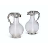 A PAIR OF PARCEL-GILT SILVER-MOUNTED CUT-GLASS CLARET JUGS - photo 1