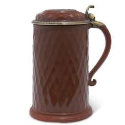 A SILVER-GILT-MOUNTED B&#214;TTGER POLISHED RED STONEWARE TANKARD AND COVER