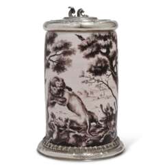 A SILVER-MOUNTED NUREMBERG FAYENCE TANKARD AND COVER