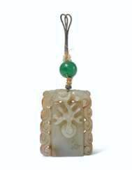 A CELADON AND RUSSET JADE 'FLAMING PEARL' PENDANT