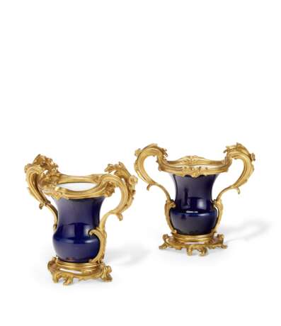 A PAIR OF LOUIS XV STYLE ORMOLU-MOUNTED COBALT-BLUE GROUND PORCELAIN VASES - photo 1