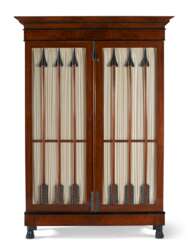 A NORTH EUROPEAN MAHOGANY AND EBONIZED ARMOIRE