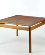 Энрико Перессутти. Study table in solid wood with square top adjustable in height, supported by four legs with crosspieces