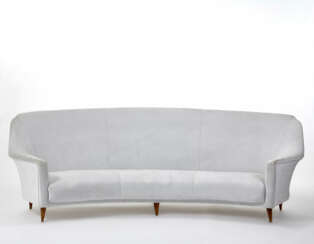 Curvilinear sofa with rounded and everted armrests model "1951