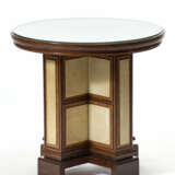 Coffee table with circular top, cross support on a bench base - photo 1