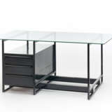 Center desk in welded square section tubular metal and painted black, double-sided chest of drawers in black stained wood, tempered glass top - фото 2
