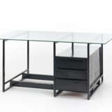 Center desk in welded square section tubular metal and painted black, double-sided chest of drawers in black stained wood, tempered glass top - Foto 3