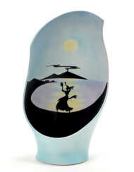 Ceramic vase glazed in opaque blue with marine and volcano depiction in black and yellow