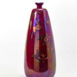 Vase in glazed ceramic with metallic luster on a burgundy background with floral decorations - photo 1