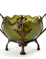 Green glass centerpiece cup with copper structure worked with floral motifs