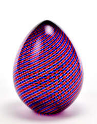 Blown glass with twisted blue, red and colorless canes egg