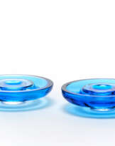 Two blue and colorless transparent blown glass bowls