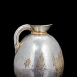 Hammered silver jug ??with globular body, flared neck and handle - фото 1