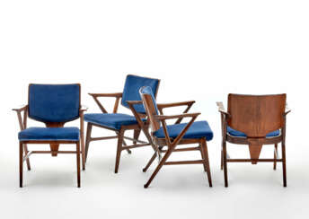 Lot consisting of four armchairs with structure in solid wood and mahogany plywood and seat and back upholstered and covered in blue velvet