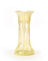 Large vase in favrile glass, with an enlarged base and rim in transparent colorless blown glass decorated with milky-yellow relief floral motifs