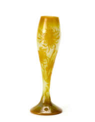 Vase with tapered bulbiform body in acid-etched cameo glass with floral decoration in relief in orange yellow on a lattimo background