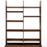 Bookcase in solid teak wood, edged and veneered, composed of three lamellar uprights, a monolithic base and nine movable shelves - photo 1